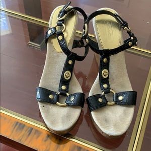 Gold and black coach wedge sandals